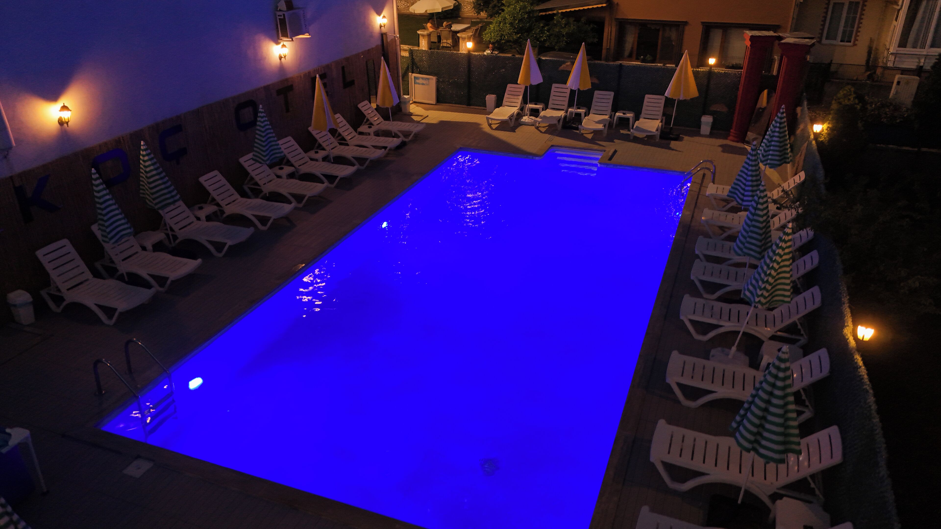 seasonal outdoor pool, open 10:00 am to 6:30 pm, pool umbrellas