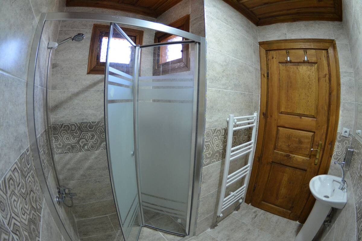 superior room | bathroom | shower, free toiletries, hair dryer, towels