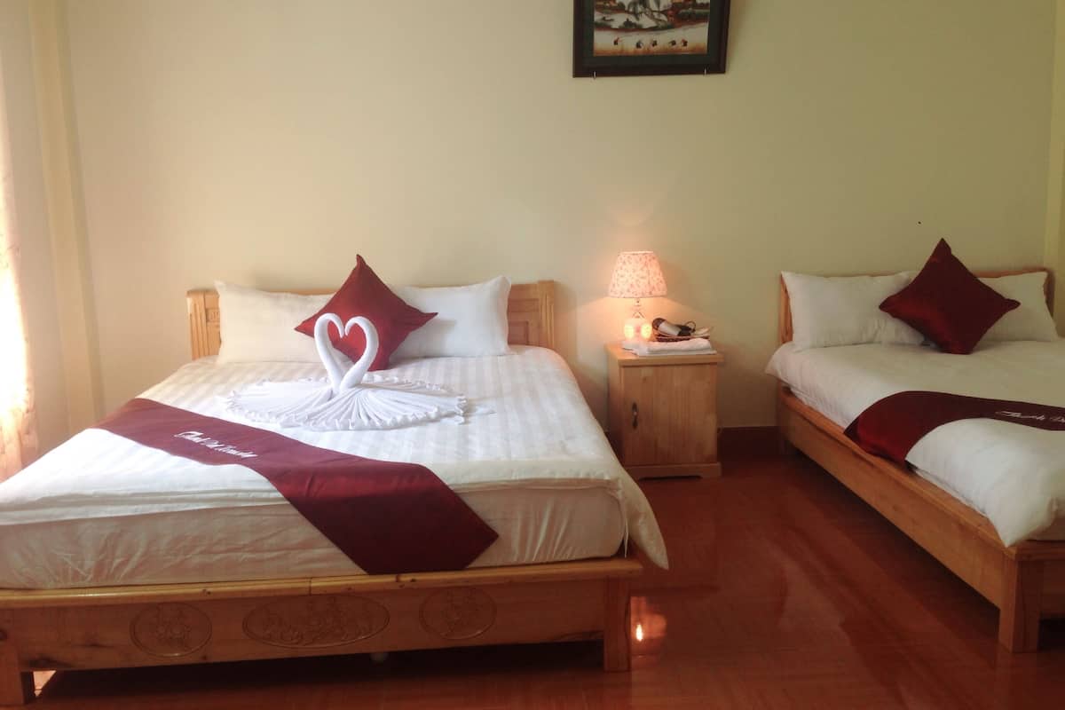 Deluxe Triple Room, Multiple Beds, Private Bathroom, Garden Area | Minibar, desk, blackout curtains, soundproofing