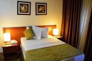 Standard Single Room, 1 Double Bed, Smoking, City View | In-room safe, desk, blackout curtains, iron/ironing board - Amerie Suites Hotel (Amman)