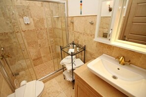 Shower, free toiletries, hair dryer, slippers