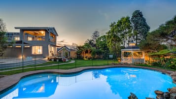 Outdoor pool, pool umbrellas, pool loungers