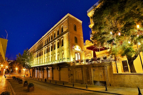 Front of property - evening/night. Kaya Ninova Hotel