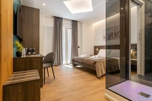 Habitación Deluxe | Ropa de cama de alta calidad, minibar, escritorio y insonorización