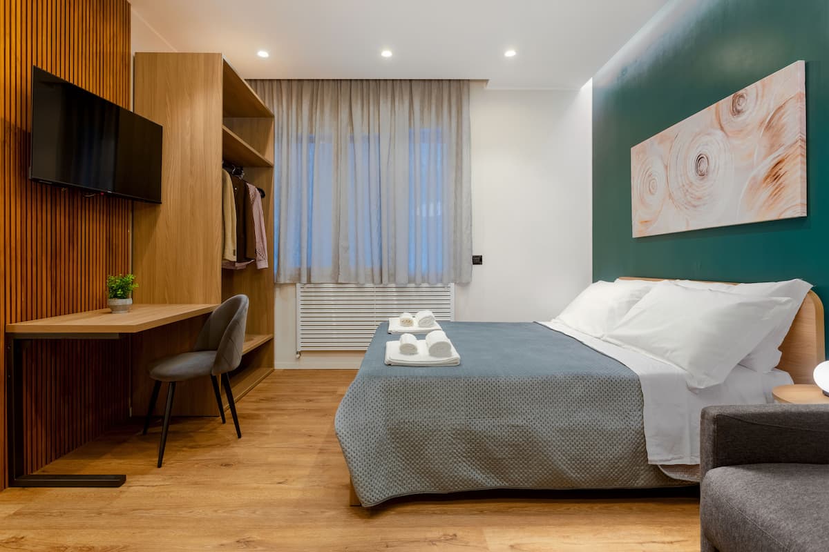 Familjestudio | 1 sovrum, sÀngtillbehör av högsta kvalitet, minibar och skrivbord