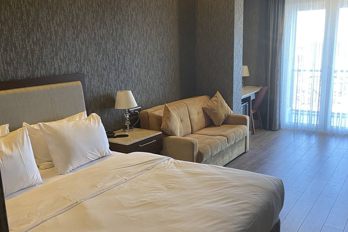family quadruple room, 2 bedrooms | 1 bedroom, minibar, in-room safe, desk