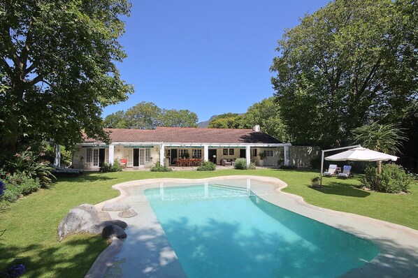 Outdoor pool, pool umbrellas, pool loungers
