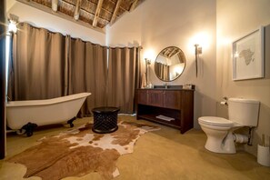 Separate bathtub and shower, deep-soaking bathtub, hair dryer, bathrobes