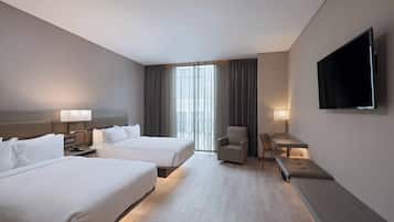 Deluxe Room, 2 Double Beds, Balcony | In-room safe, desk, blackout curtains, soundproofing