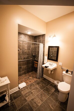 Shower, rainfall showerhead, designer toiletries, hair dryer