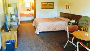 Habitación Deluxe, 1 cama Queen size | Escritorio, tabla de planchar con plancha, camas extra y wifi gratis