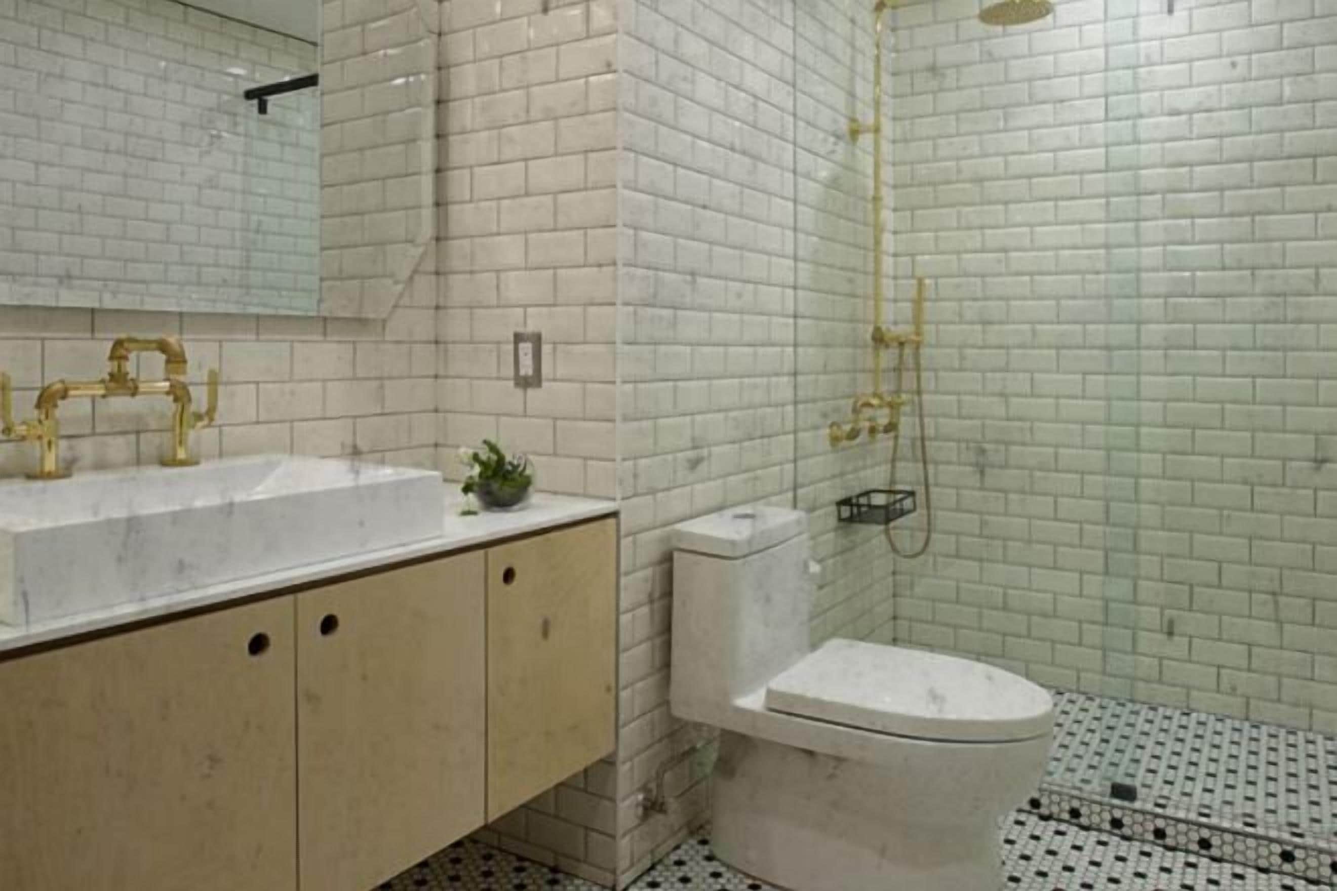 Shower, rainfall showerhead, designer toiletries, hair dryer