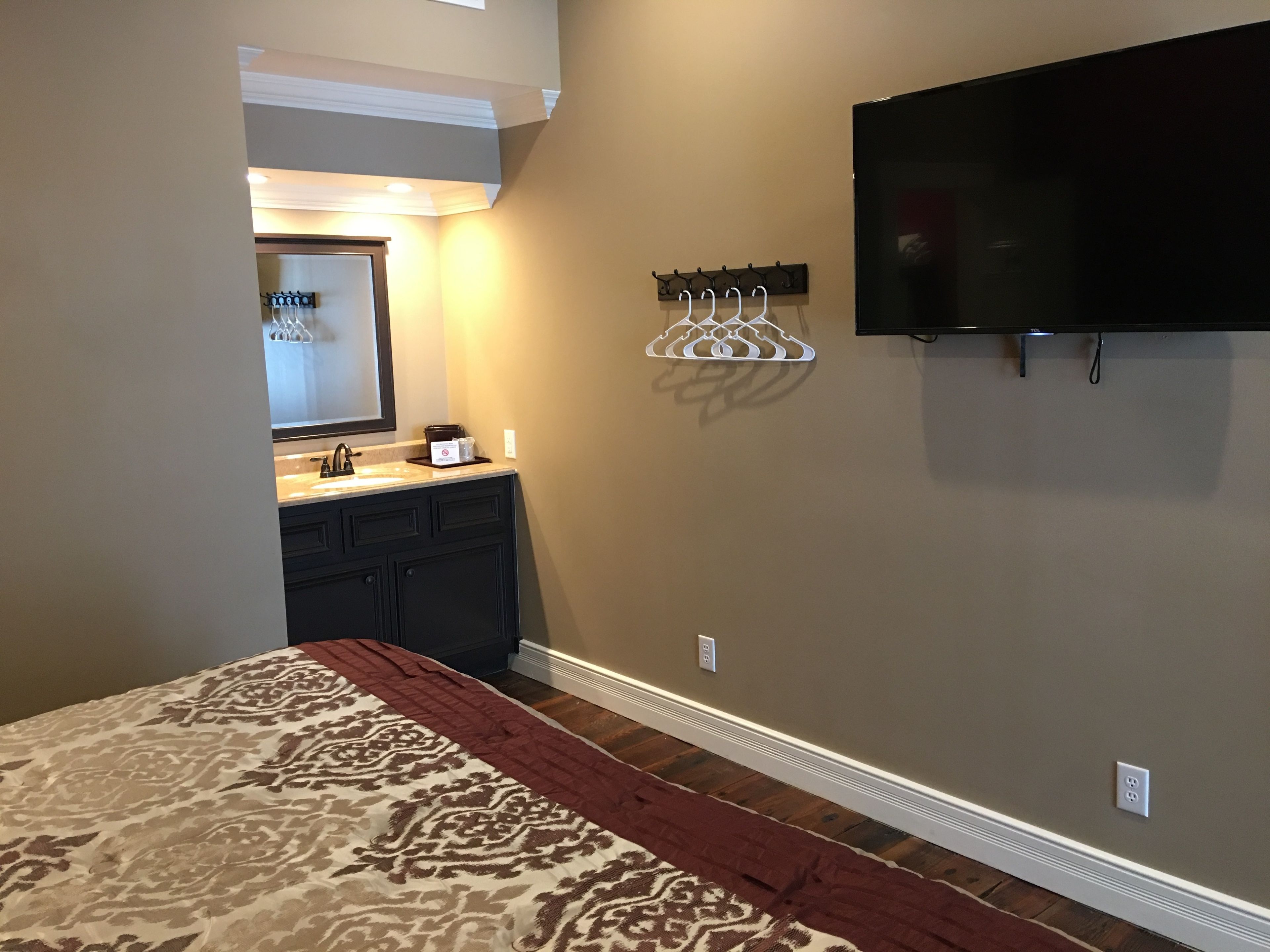 deluxe room, 1 king bed | premium bedding, iron/ironing board, free wifi, bed sheets