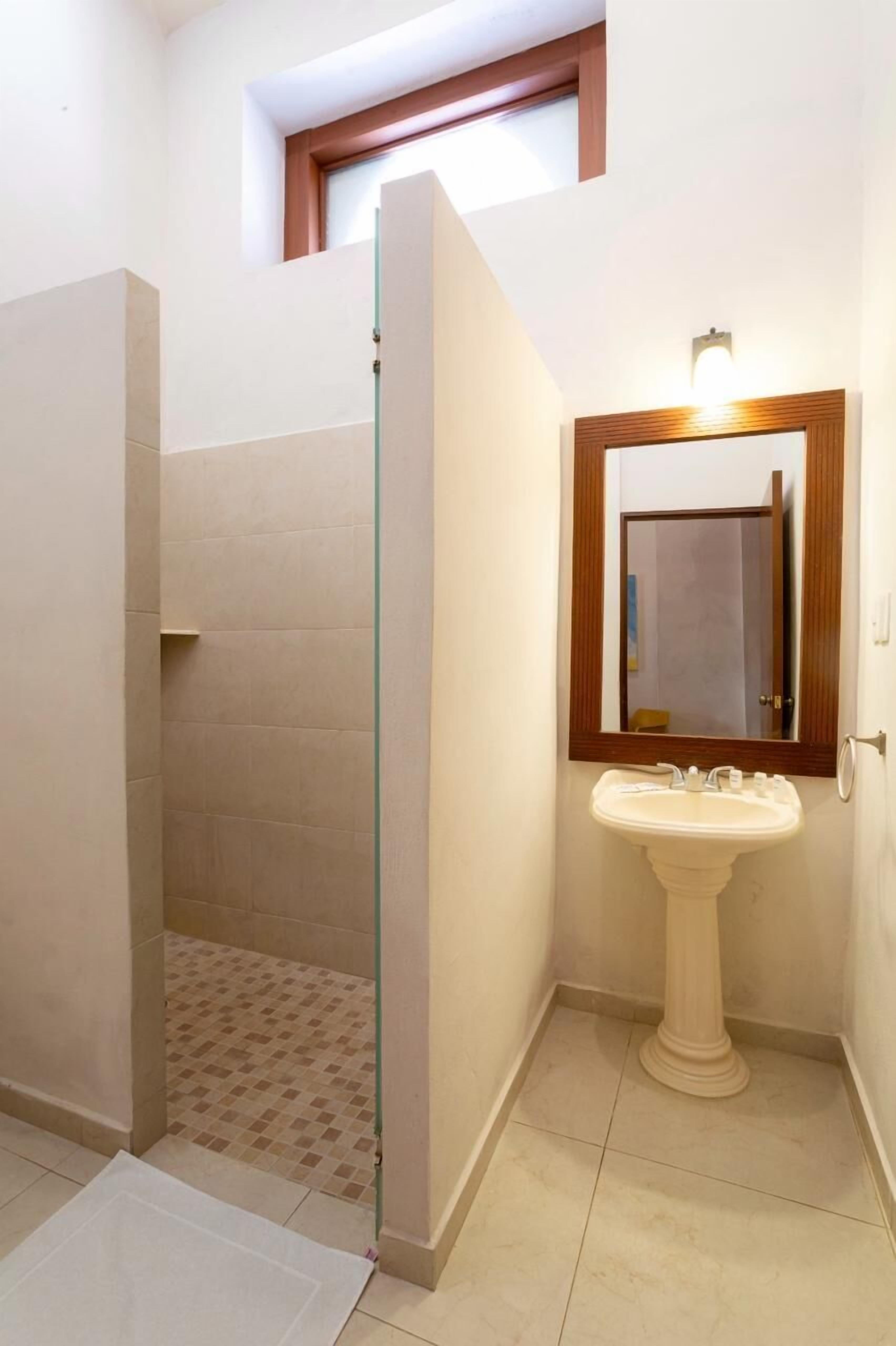 junior suite | bathroom | shower, towels, soap, shampoo