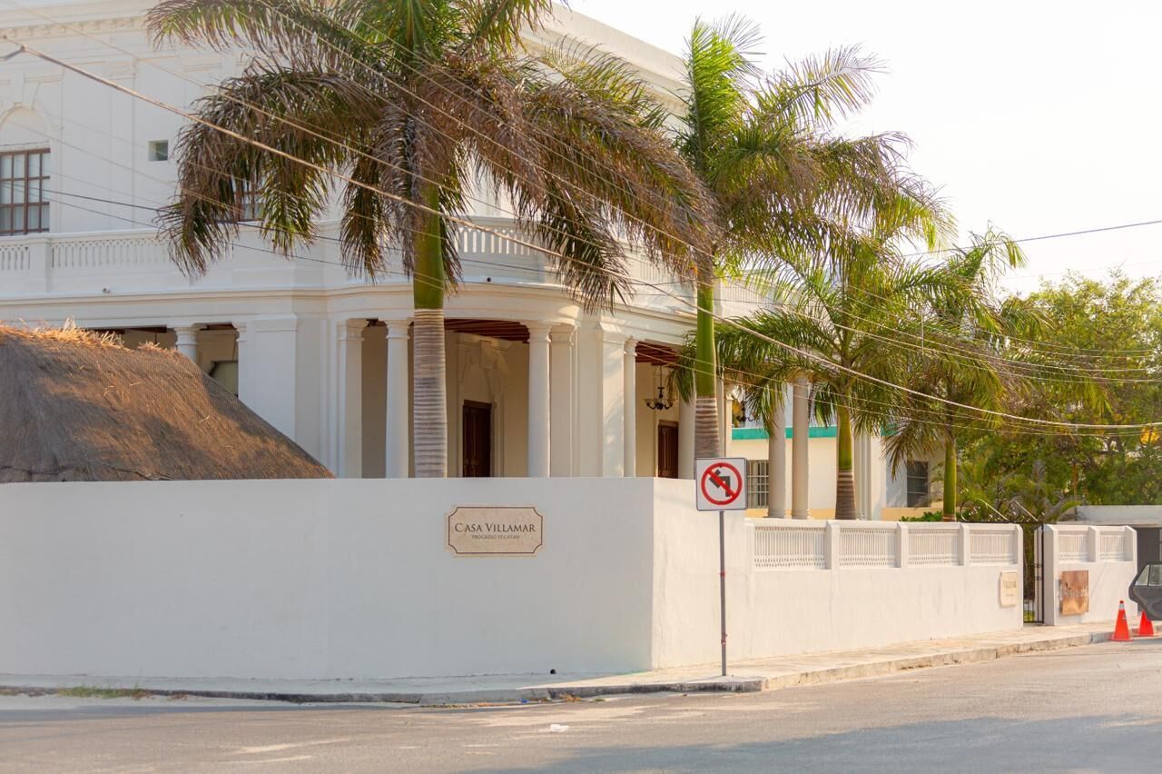 A white building with a sign reading "Casa Villamar."