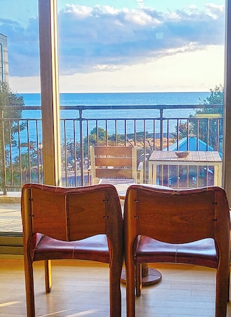 Superior Studio | Living area | TV, fireplace, heated floors