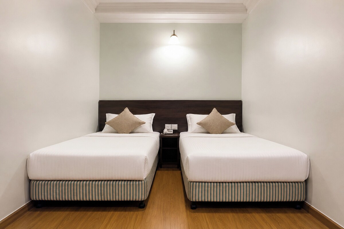 Twin Room | Desk, iron/ironing board (on request), free WiFi, bed sheets