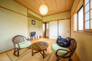 Corner Japanese Room with Shared Bath (Caters to 13years old or older)