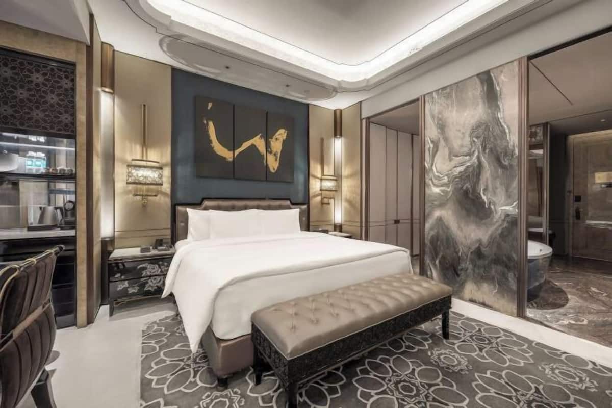 Premium bedding, down duvets, minibar, in-room safe