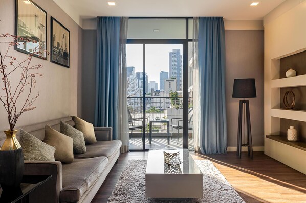 Deluxe Suite, 3 Bedrooms | Living area