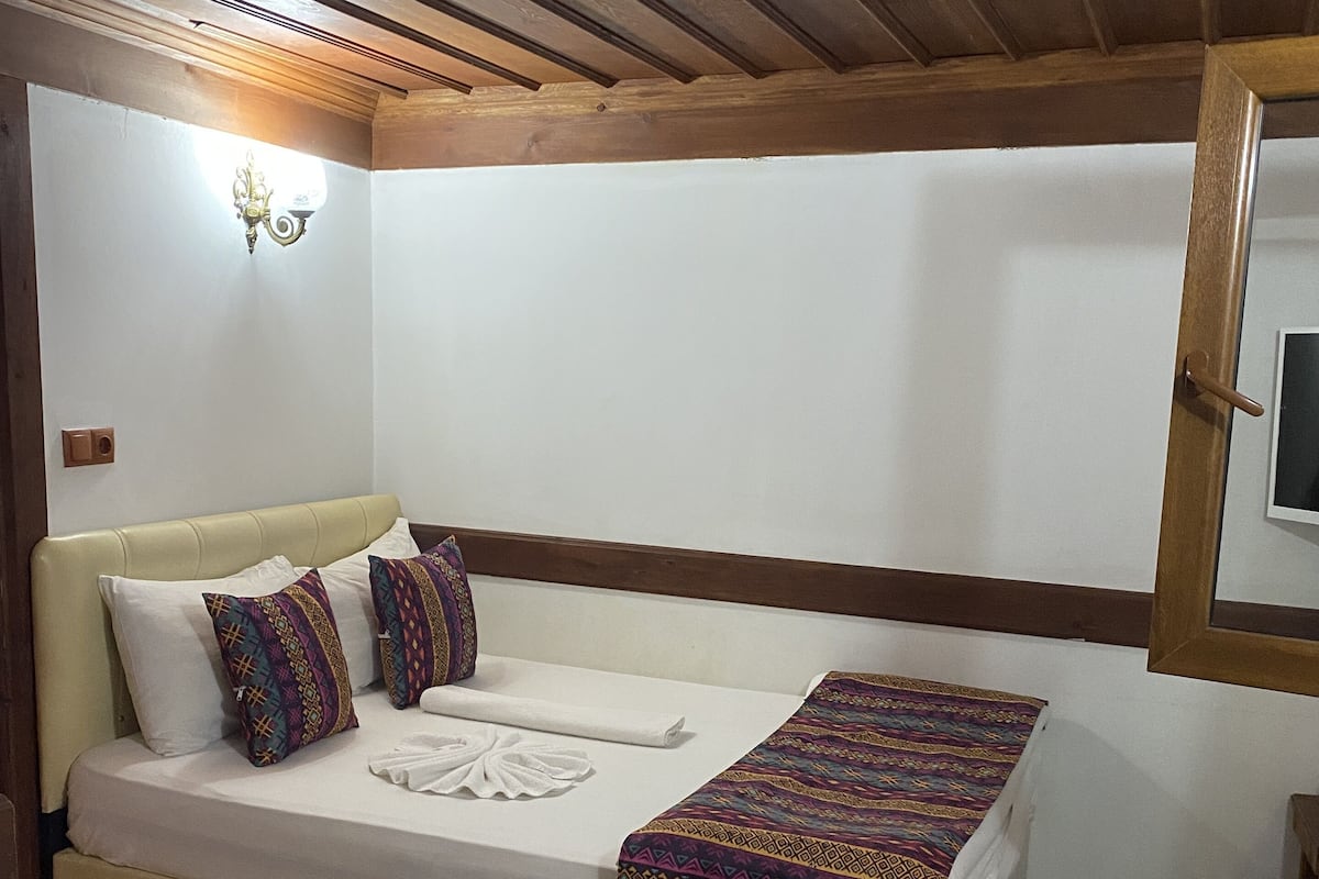 Premium bedding, desk, laptop workspace, free WiFi