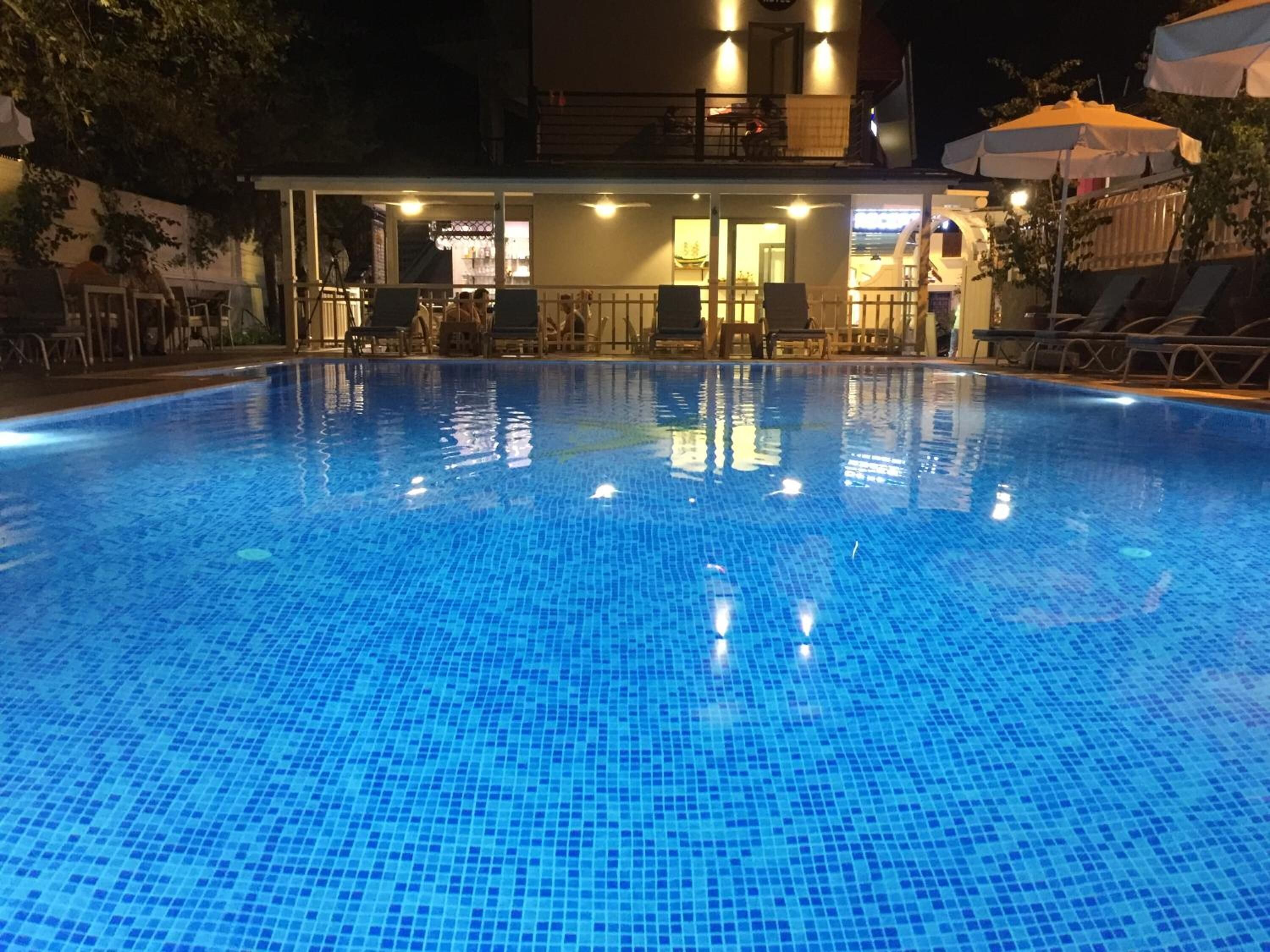 Outdoor pool, pool umbrellas, pool loungers