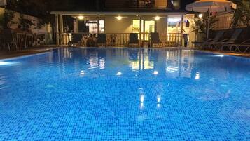 Outdoor pool, pool umbrellas, pool loungers