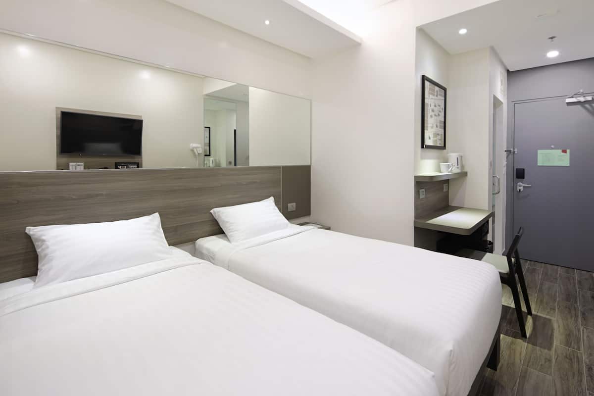 Twin Room | Premium bedding, in-room safe, desk, blackout drapes