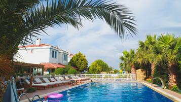 Outdoor pool, pool umbrellas, pool loungers