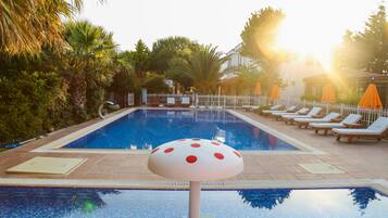 Outdoor pool, pool umbrellas, pool loungers