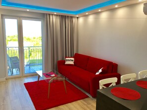 Deluxe-Apartment (Panoramiczna 12) | Wohnzimmer | Fernseher