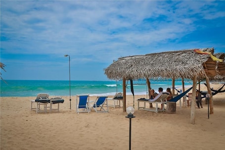 Private beach. Harmony Beach Bungalows