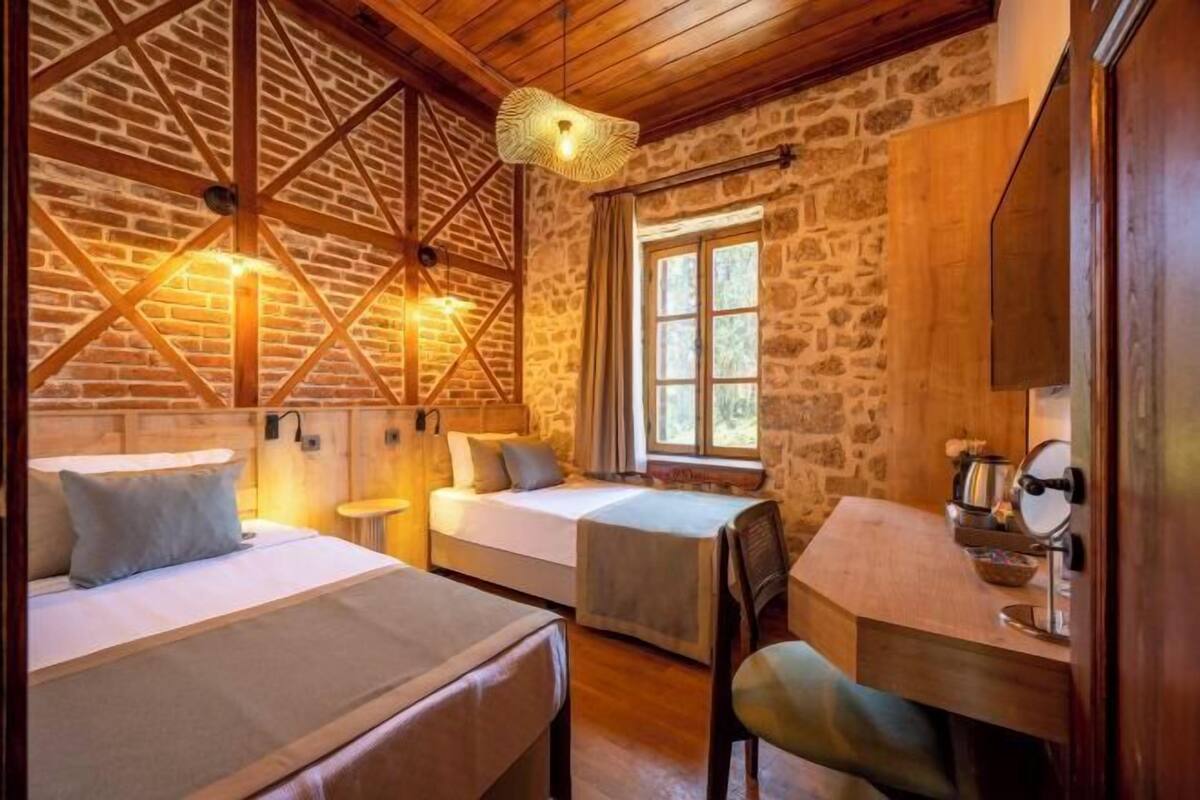 Roba de llit d'alta qualitat, minibar, wifi gratuïta i roba de llit
