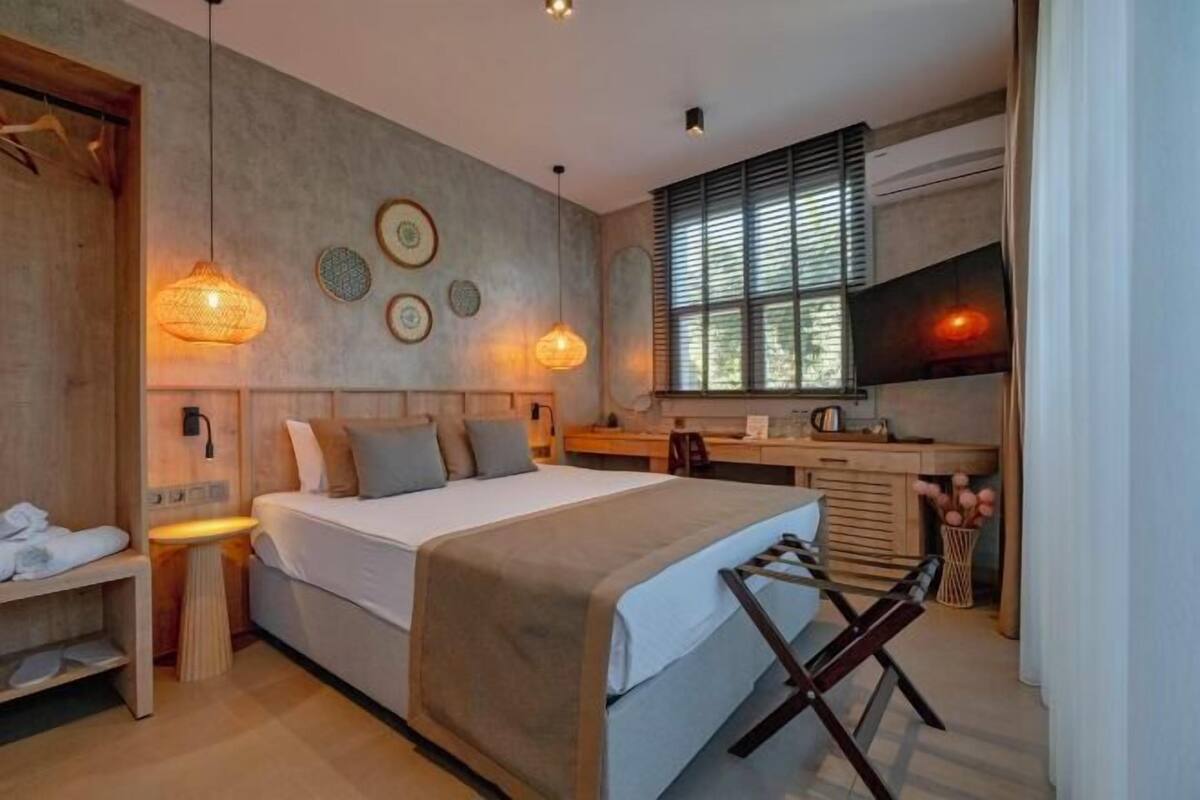 Roba de llit d'alta qualitat, minibar, wifi gratuïta i roba de llit
