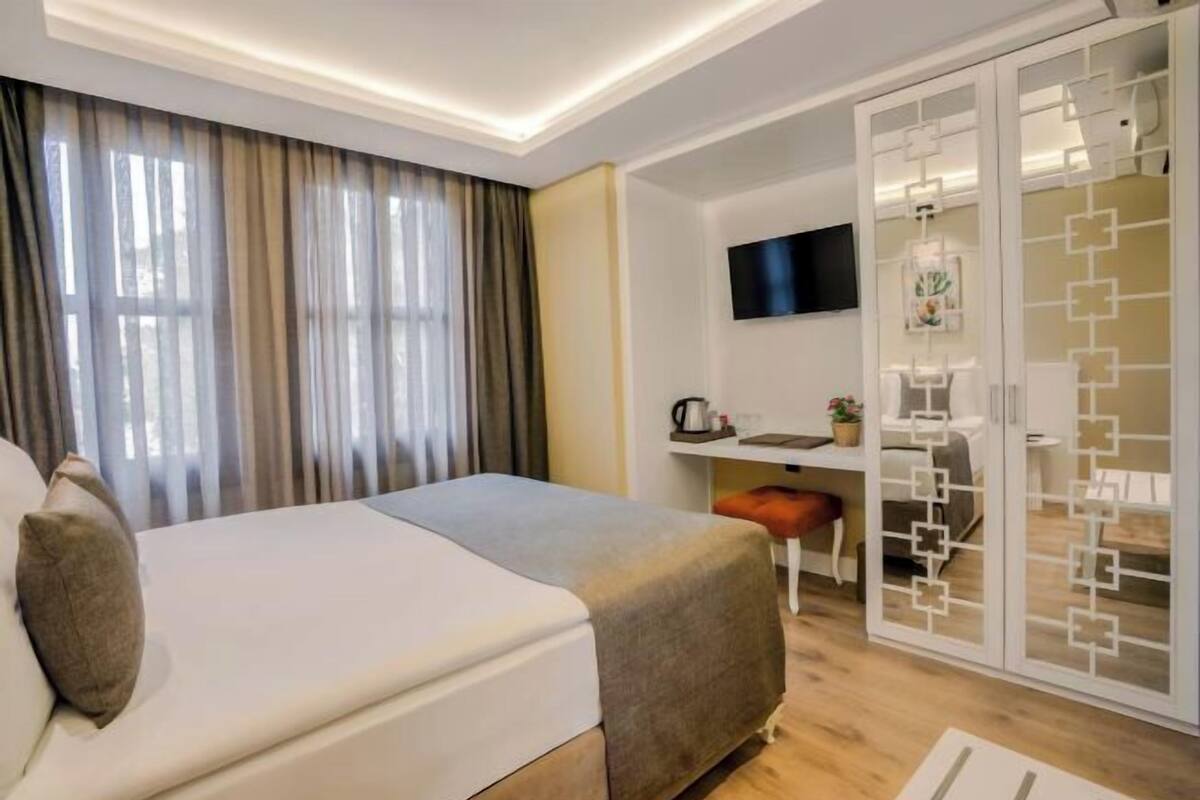 Sengetøy av topp kvalitet, minibar, wi-fi (inkludert) og sengetøy