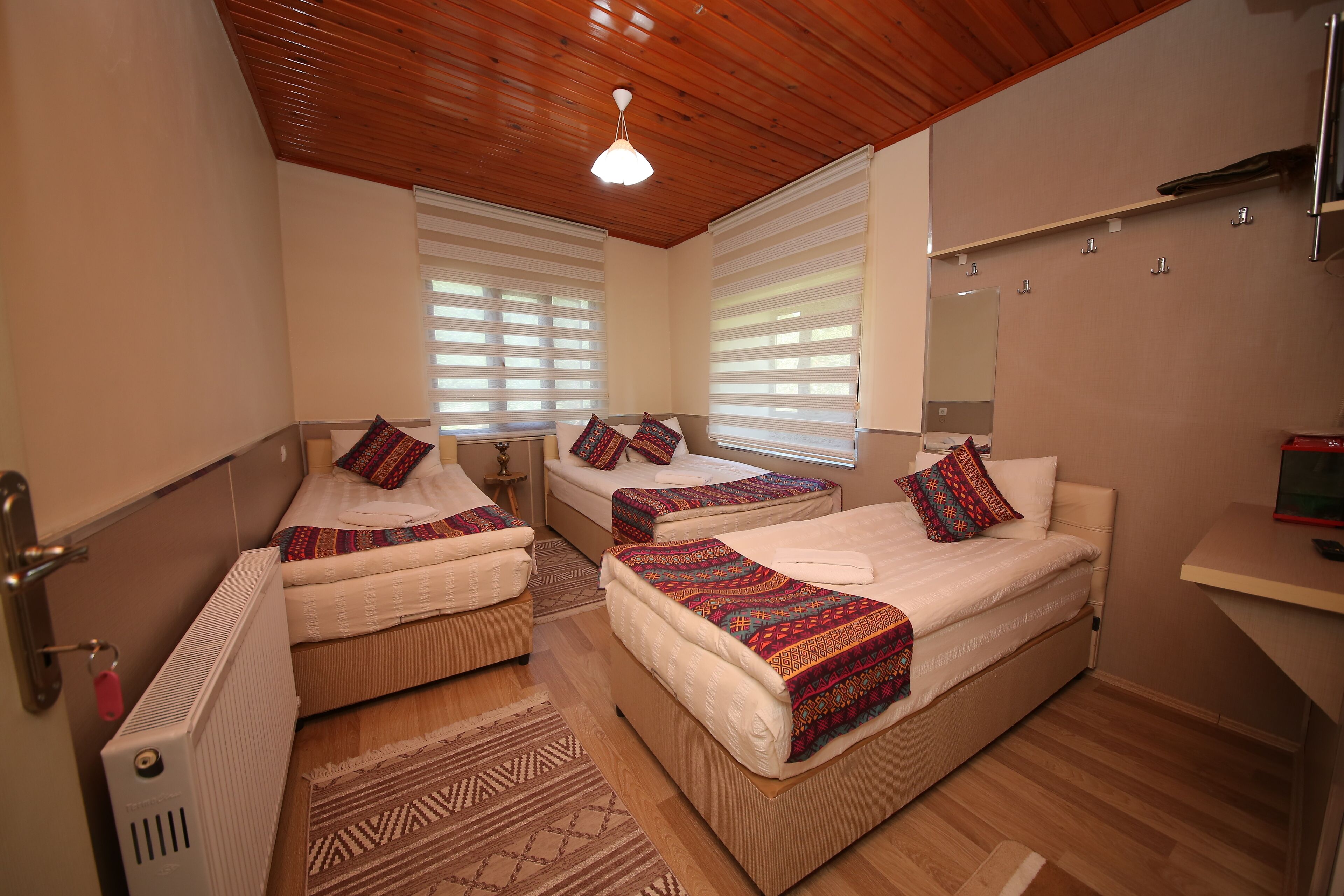 standard quadruple room, multiple beds, valley view, garden area | 1 bedroom, premium bedding, desk, soundproofing