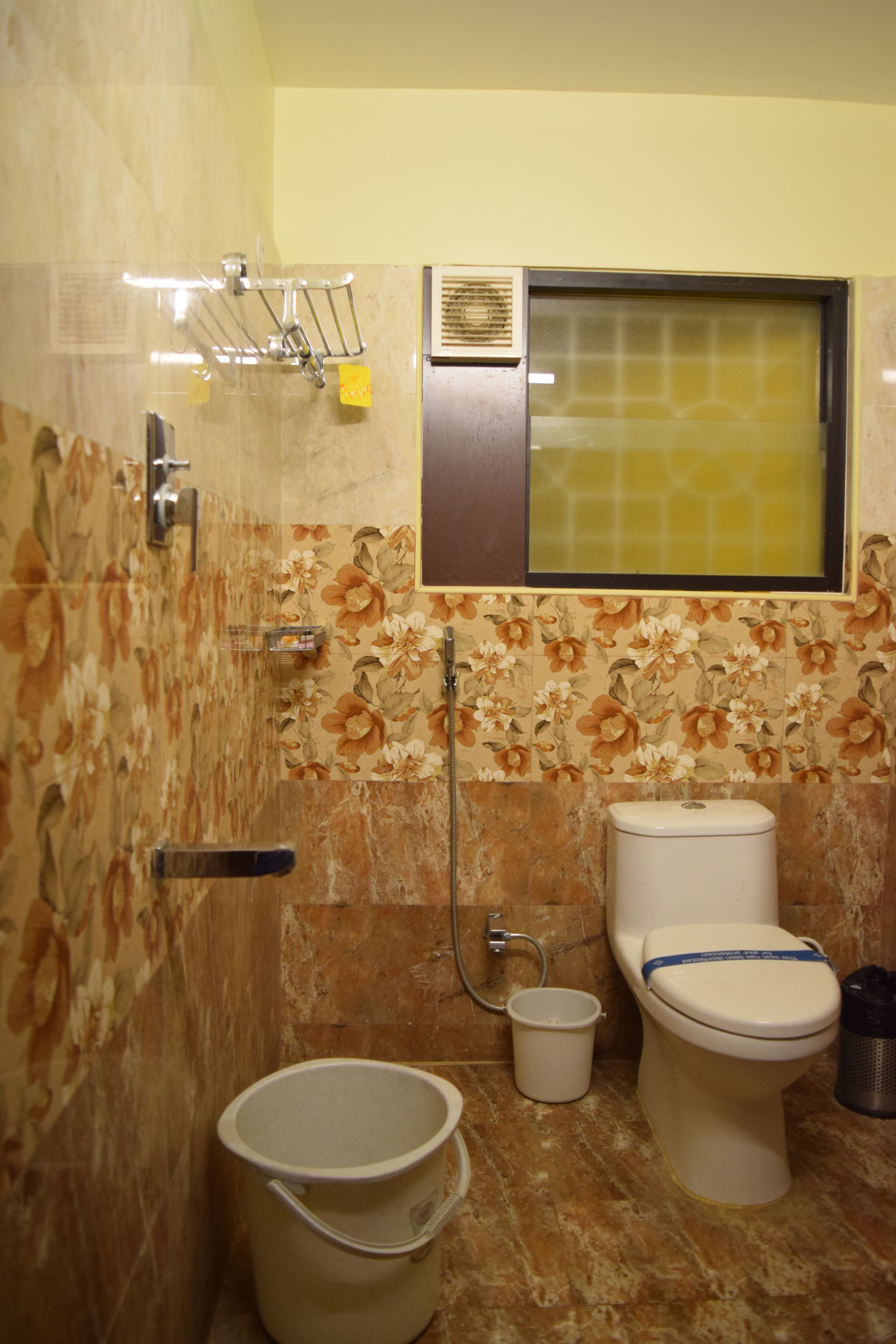 shower, rainfall showerhead, designer toiletries, hair dryer