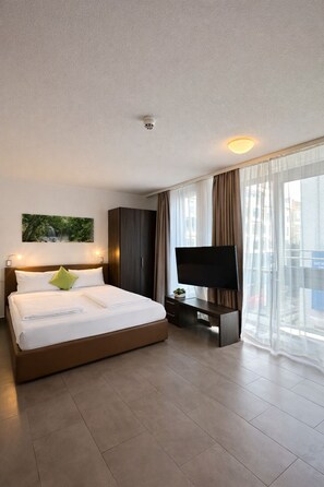 Estudio, 1 cama Queen size y sofá cama | Caja de seguridad en la habitación y insonorización 