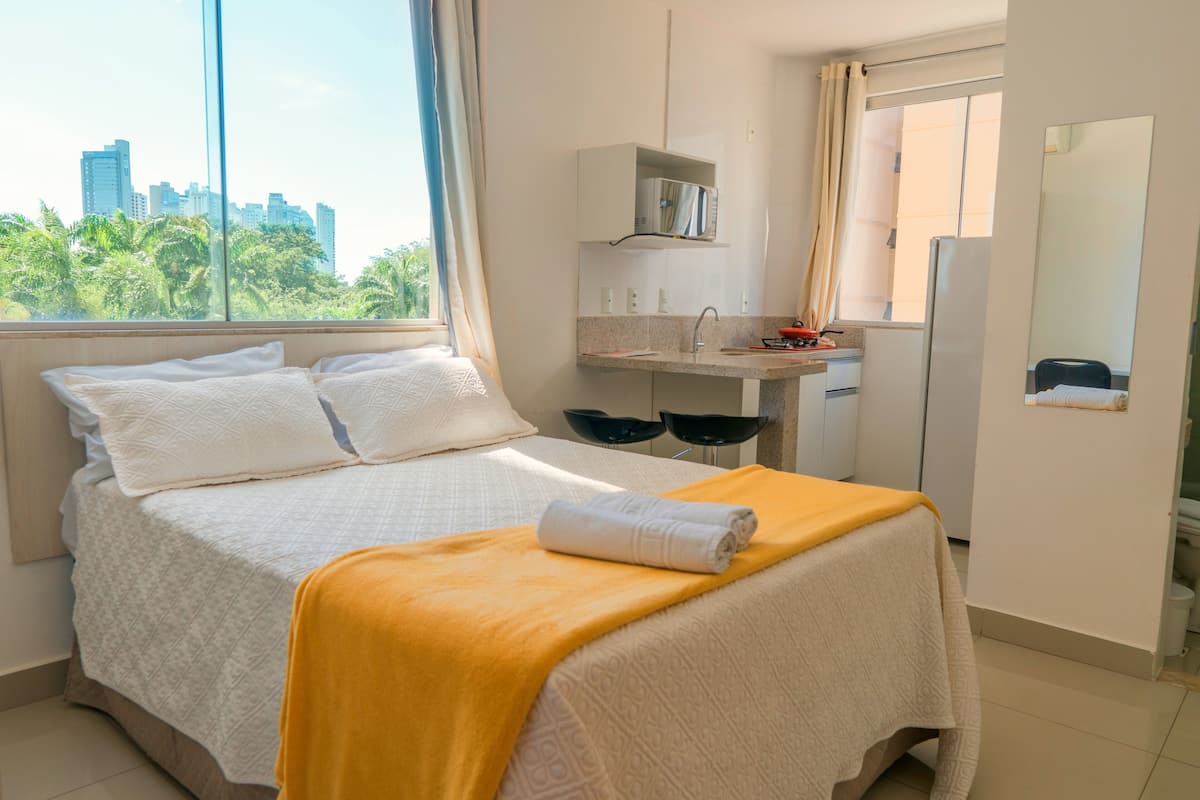 Basic Double Room Single Use | Premium bedding, desk, blackout drapes, iron/ironing board
