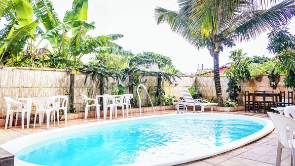 Outdoor pool, open 9:00 AM to 10:00 PM, sun loungers