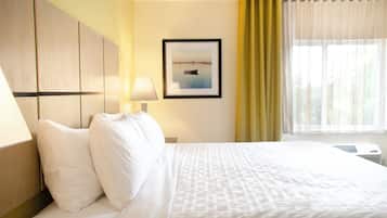 Desk, laptop workspace, blackout drapes, iron/ironing board