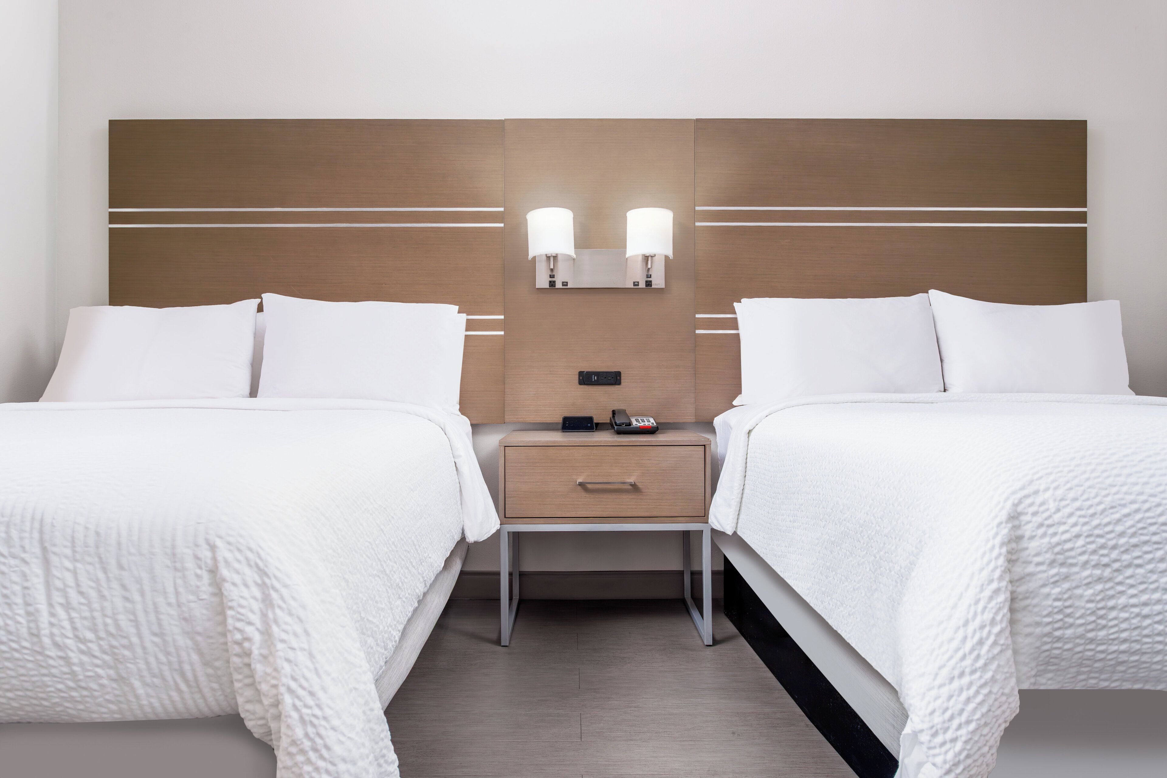 Desk, blackout drapes, iron/ironing board, rollaway beds