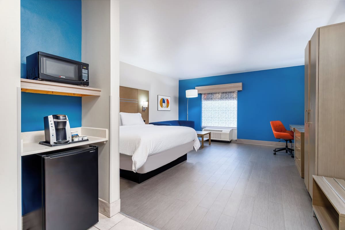 Desk, blackout drapes, iron/ironing board, rollaway beds