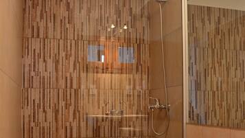 Shower, free toiletries, hair dryer, towels