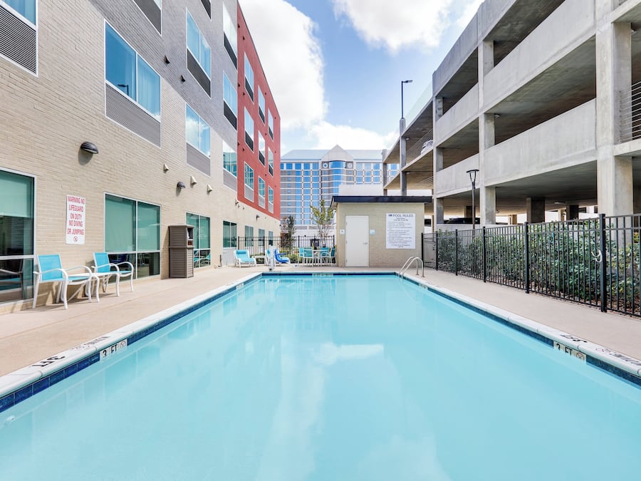 Outdoor pool, open 10:00 AM to 10:00 PM, sun loungers
