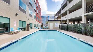 Outdoor pool, open 9:00 AM to 10:00 PM, sun loungers