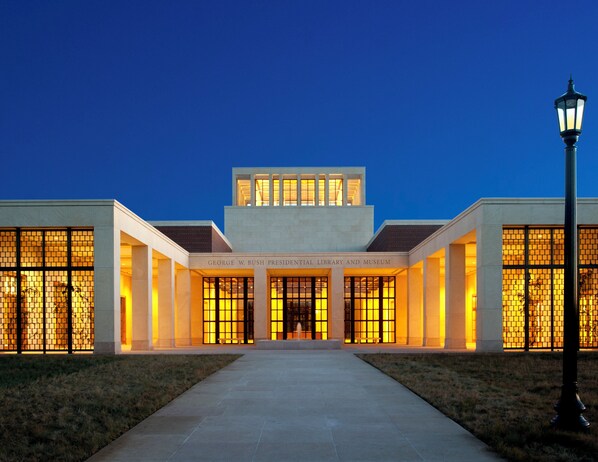 A building with a large entrance, columns, and a sign reading 'George W. Bush Presidential Library and Museum.' - Candlewood Suites Dallas NW - Farmers Branch by IHG (Farmers Branch)