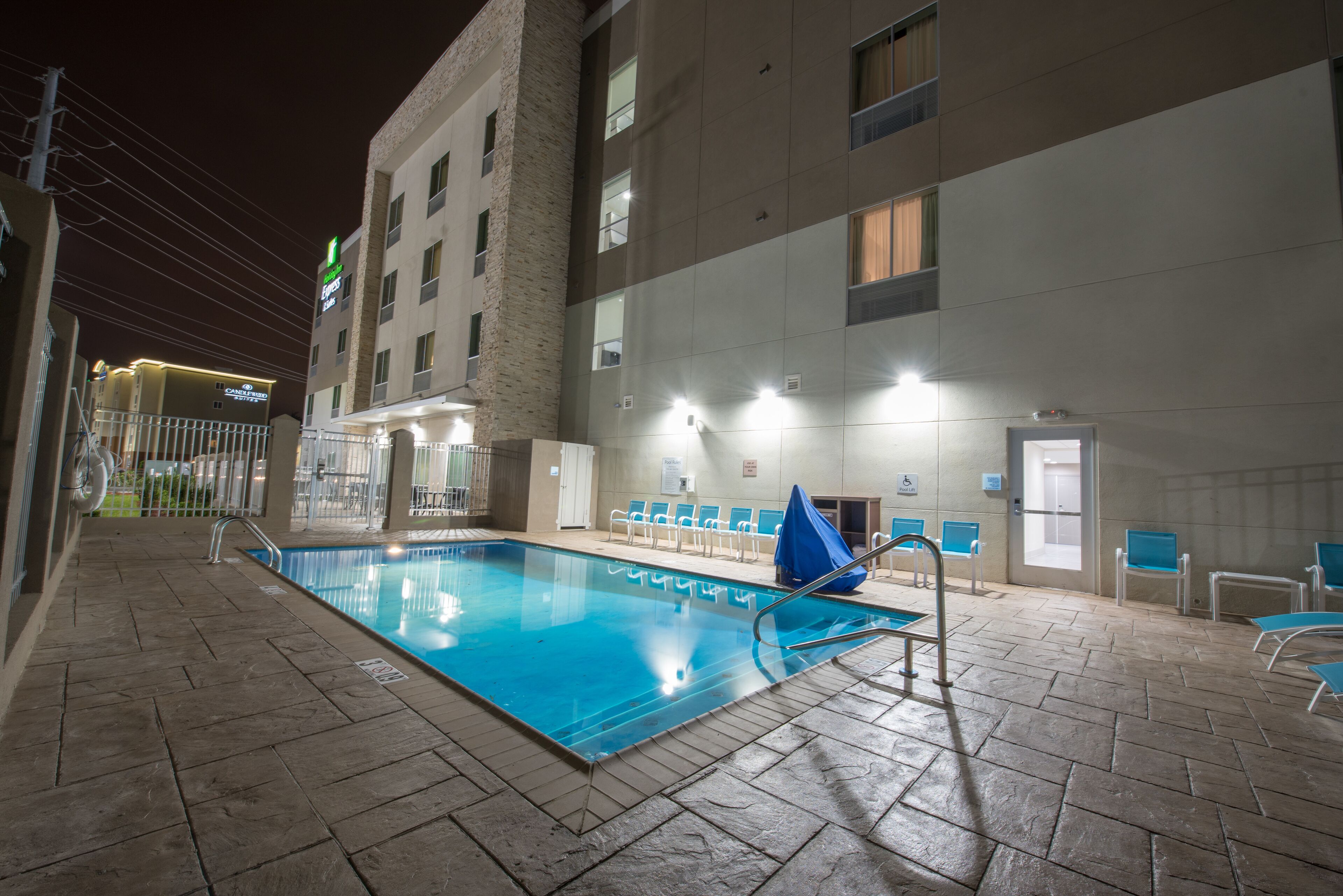 outdoor pool, open 9:00 am to 10:00 pm, pool umbrellas, pool loungers