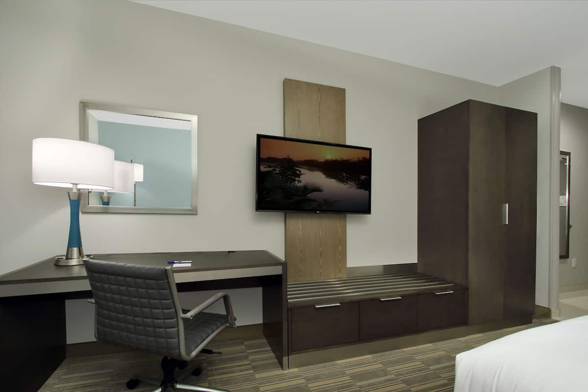 Desk, laptop workspace, blackout curtains, iron/ironing board