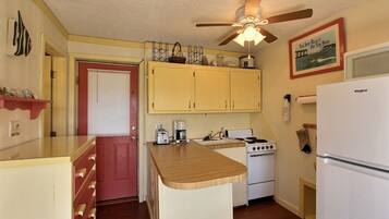 Studio | Private kitchen | Full-sized fridge, microwave, stovetop, coffee/tea maker